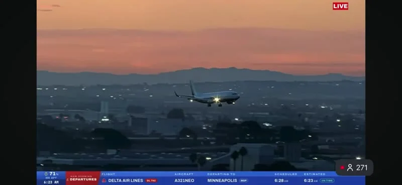 Aircraft approaching the runway at sunset